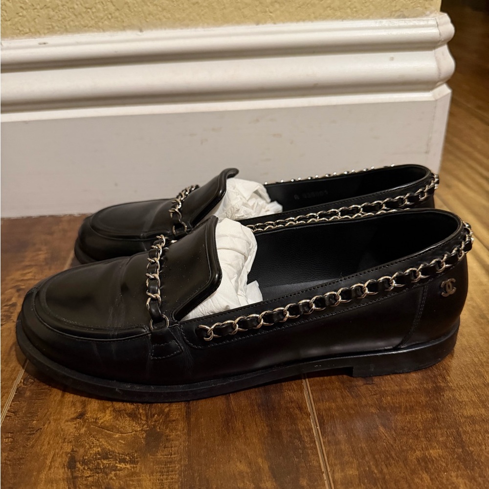 CHANEL Black Loafers with Silver Chain Accent